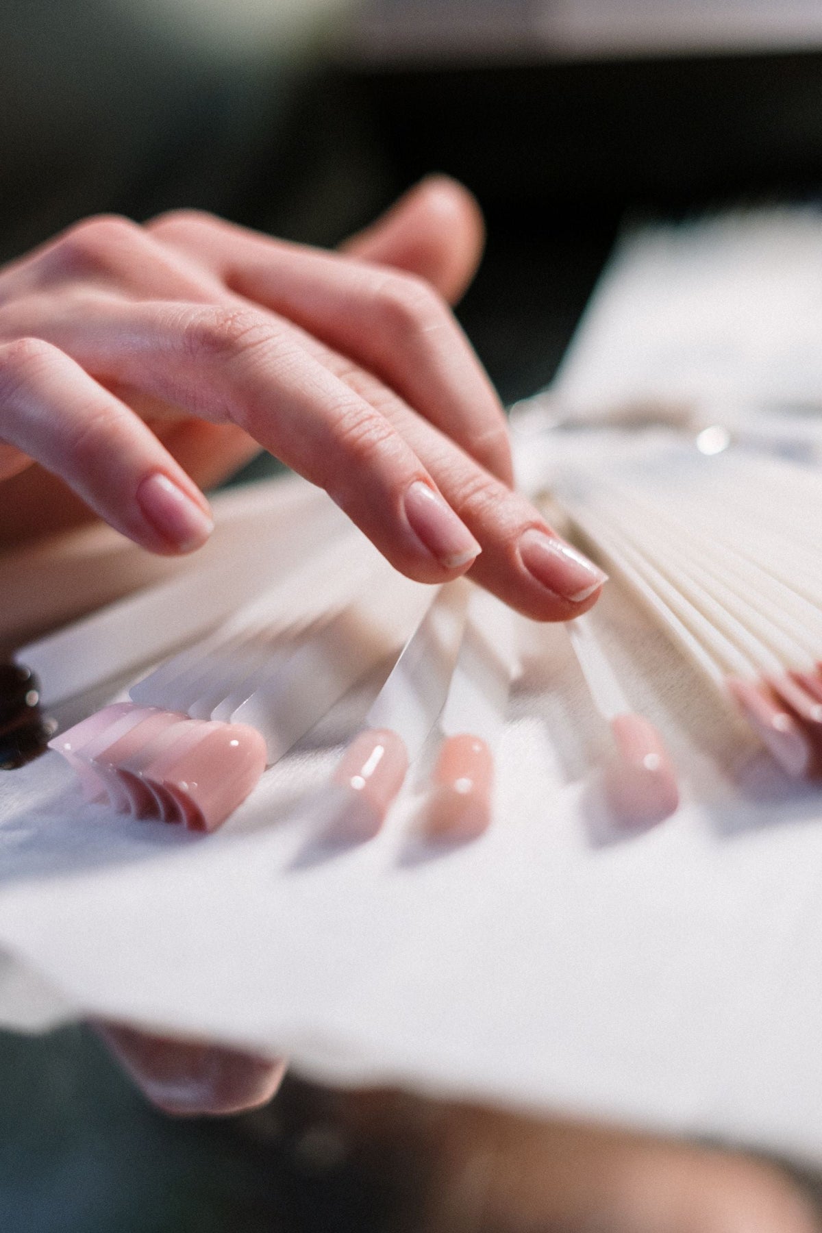 Natural unbranded nails and hands in soft daylight